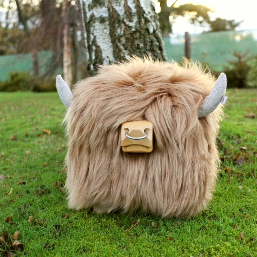 Highland cow footstool deals